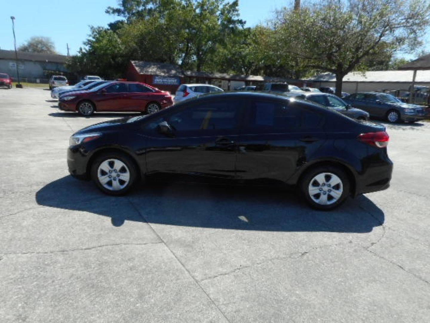 2017 BLACK KIA FORTE LX (3KPFK4A79HE) , located at 10405 Abercorn Street, Savannah, GA, 31419, (912) 921-8965, 31.988262, -81.131760 - Photo#1